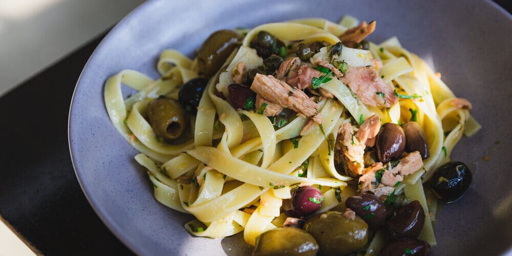 Fettuccelle De Cecco with tuna, olives and capers