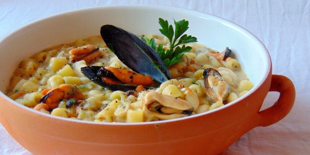 Borlotti beans soup with mussels, potato and silverbeet