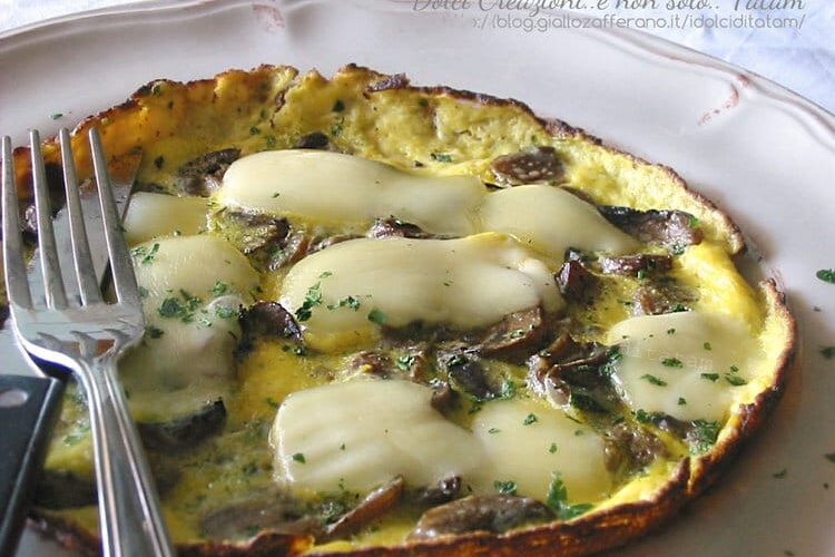 Frittata with button and porcini mushroom and fresh Asiago cheese