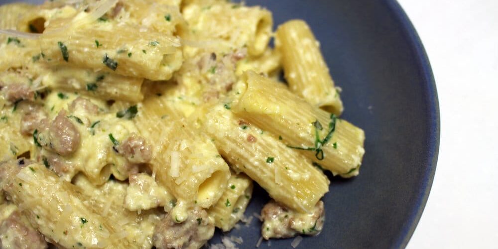 Rigatoni De Cecco alla Norcina with Italian sausage, ricotta cheese and truffle scent.