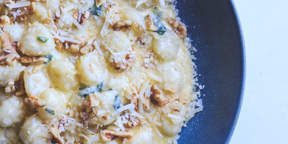 Potato Gnocchi with Raschera cheese fondue and walnuts