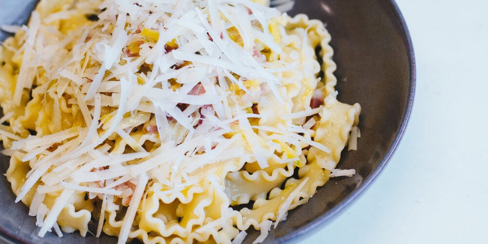 Mafaldine De Cecco with leeks, pancetta and Sardinian goat’s cheese