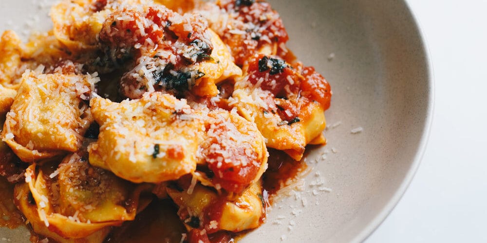 Tortelli porcini mushroom bertagni “carrettiera” with garlic, Italian parsley and tomato