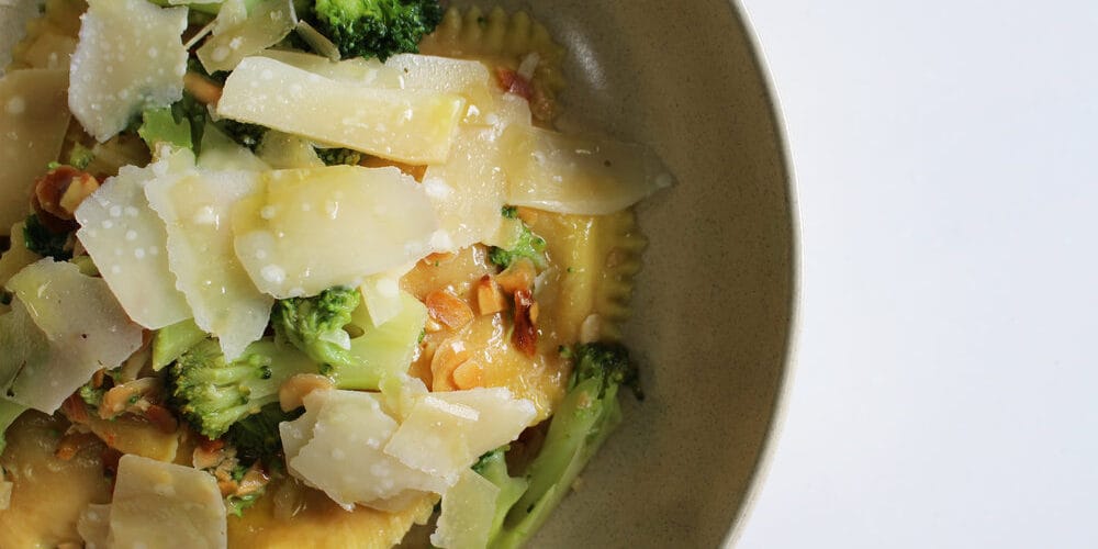 Ravioli Bertagni — Mezzelune Goat’s Cheese and Roasted Tomato with Broccoli & Toasted Almonds